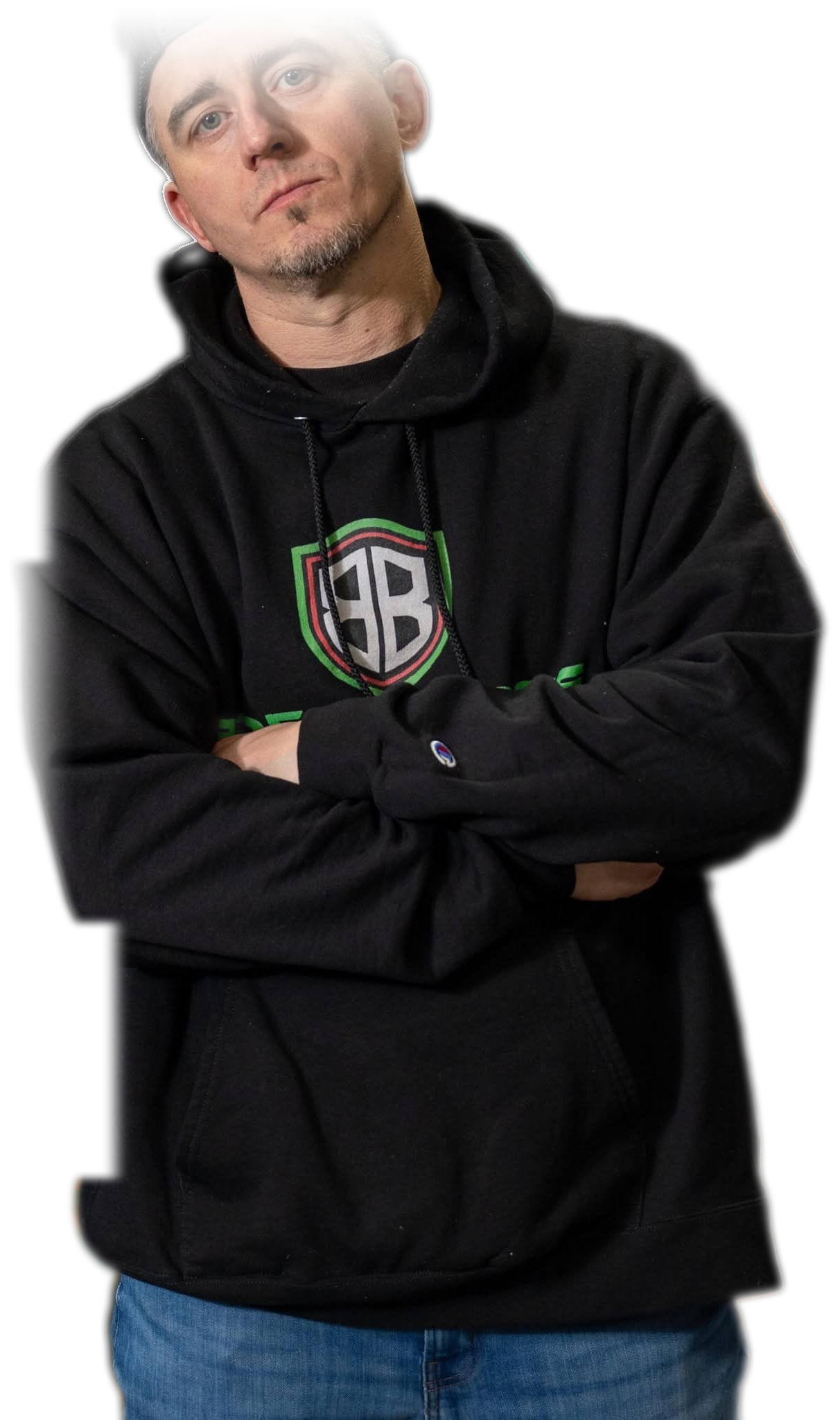 Jay Macklin, Break Boss founder, arms crossed in the shop hoodie